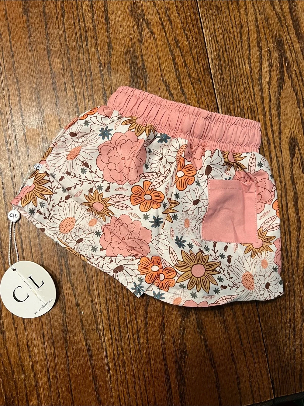 Caden Lane White Floral Swim Trunks with Orange and Pink Accents